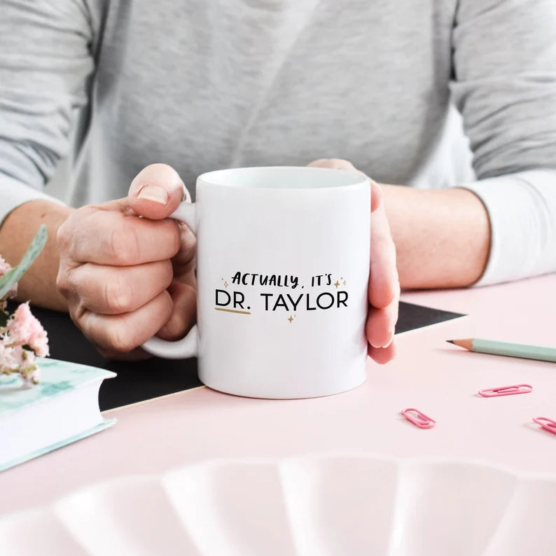 Personalised Doctor Gift Mug reads "Actually It's Dr. [name here]"