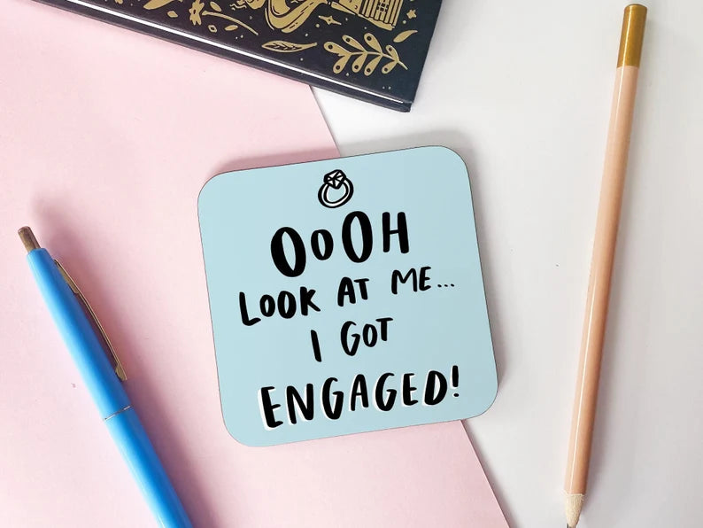 Engaged Gift Coaster reads "Oooh Look At Me... I Got Engaged!"
