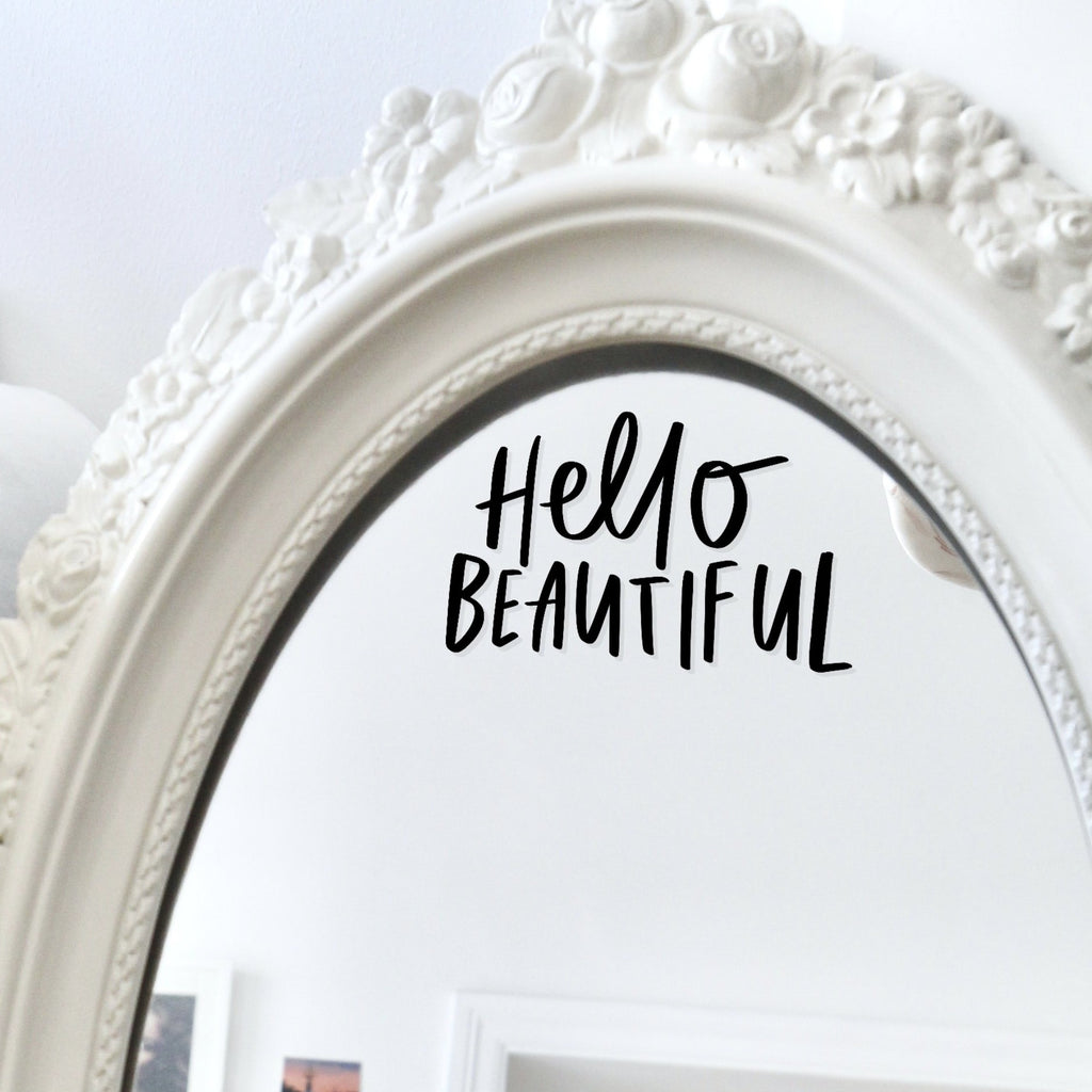 positive Mirror decal reading "Hello Beautiful"