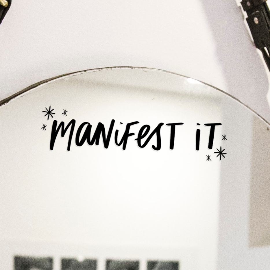 Vinyl mirror decal reading "Manifest it"