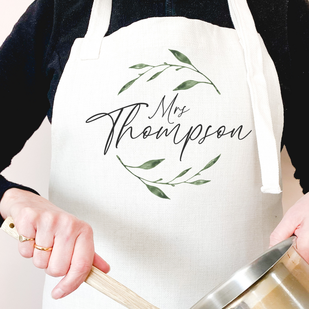 A personalised apron botanical wedding dress protector by Studio Yelle