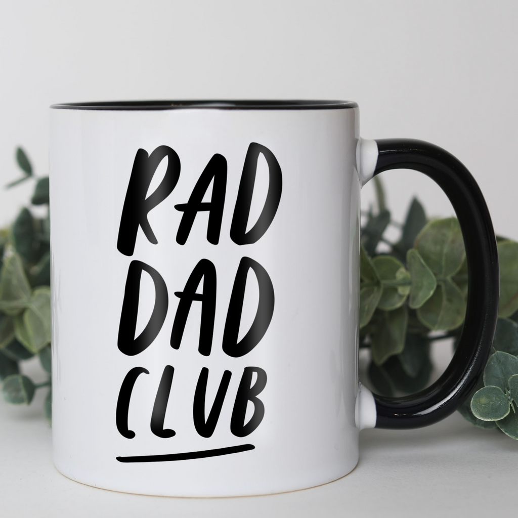 Black handle 11oz ceramic mug reading "Rad Dad Club" in our signature hand-lettered style gift for dad
